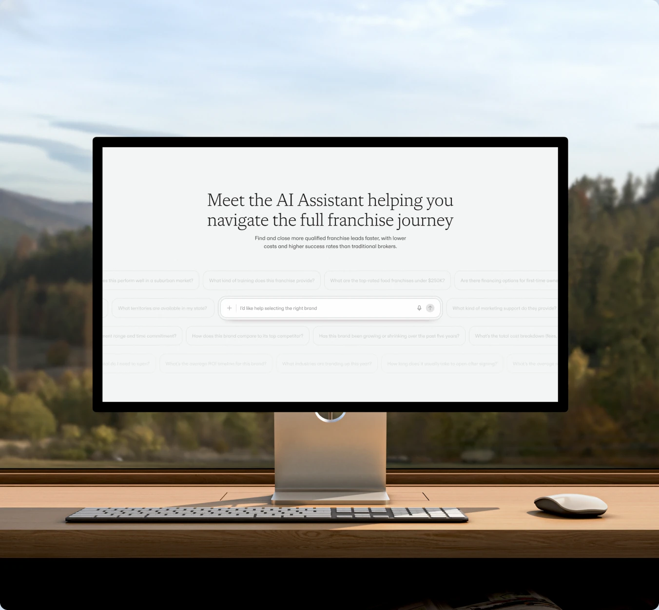 A desktop display on a wooden desk showing glidepath.com — “Meet the AI Assistant helping you navigate the full franchise journey”