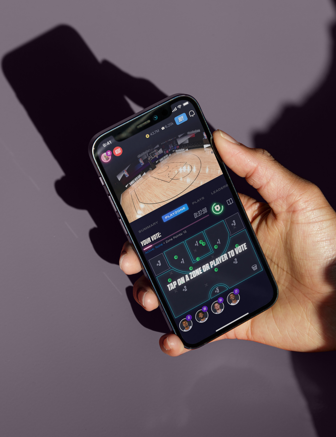 Photo of iPhone showing live game voting